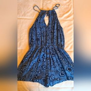 Aeropostale blue romper with navy flowers, size small